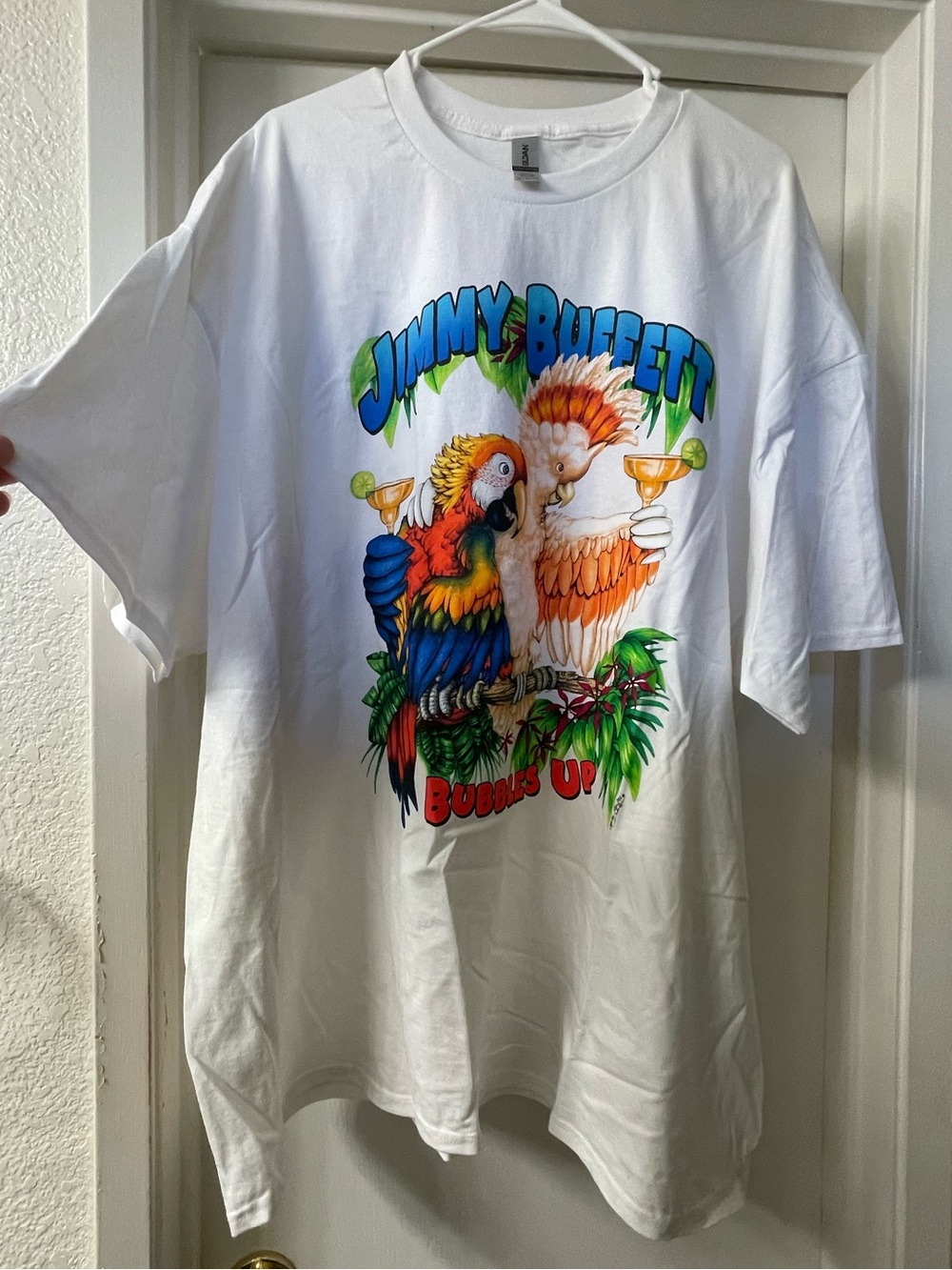 Jimmy Buffet “Bubbles Up” White Parrot Graphic Concert Tee